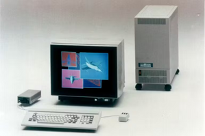 An IRIS 2000 Terminal Sitting on a Table with a monitor.